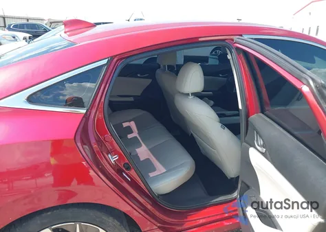 2022 Honda Insight Touring z USA, uszkodzony, nr VIN 19XZE4F92NE016849